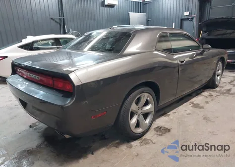 2013 Dodge Challenger Sxt z USA, uszkodzony, nr VIN 2C3CDYAG5DH593050
